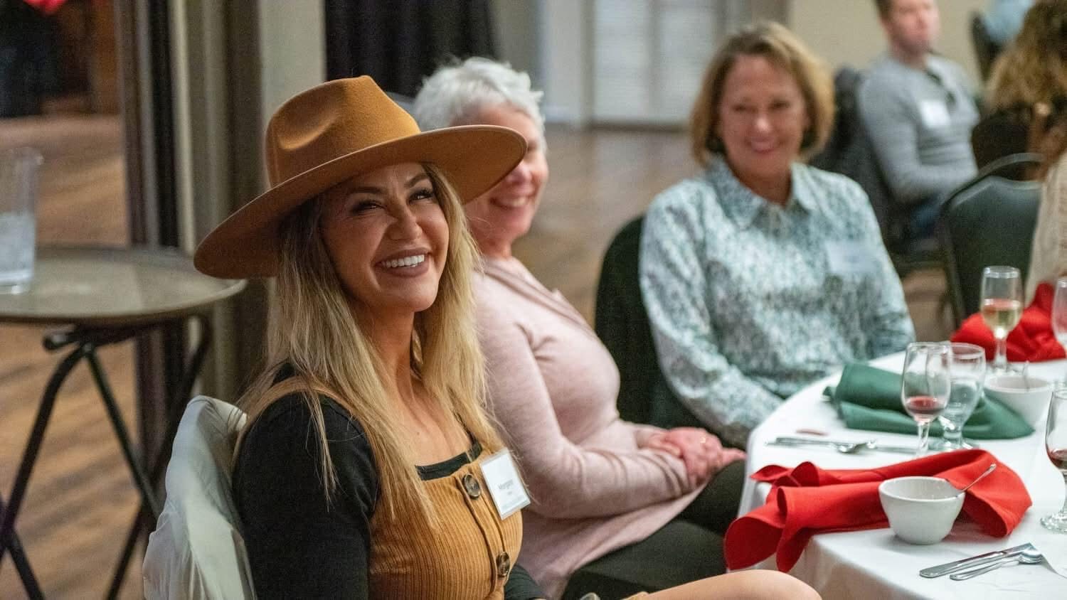 Breast Connect member smiling at a community gathering event